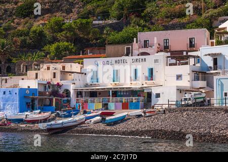 Sicily - Sunny impressions of the Aeolian Islands, also known as Aeolian Islands or Isole Eolie: Lipari, Stromboli, Salina, Vulcano, Panarea, Filicudi and Alicudi. Colorful hotel on Filicudi. Stock Photo