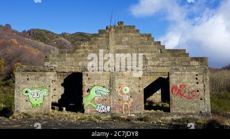 Etna, Etna National Park, Parco dell –´Etna, road to the summit, SP92, ruins, pyramid-shaped, graffiti, sky blue, cloud white Stock Photo