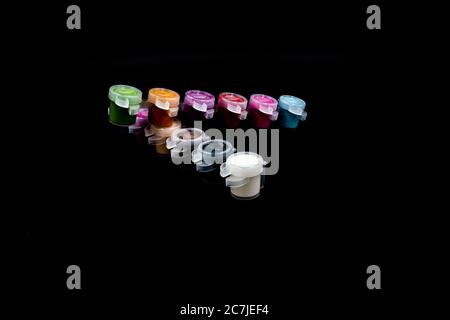 GLOUCESTER, UNITED KINGDOM - Jan 06, 2020: Paint pots containing acrylic paint ideal for hobby craft Stock Photo