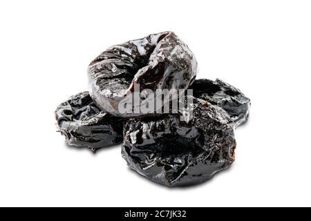 Pile of dried pitted prunes on white background with clipping path. Stock Photo