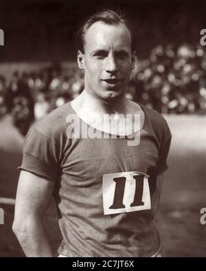 Eric Liddell (1902-1945), British Olympic Gold Medalist runner and Christian missionary to China. Pictured at the 1924 Olympic Games in Paris, Liddell, a devout Christian, refused to run in his favored 100-meter race because the event was to be held on Sunday. Instead, he ran in the 400-meter race on a weekday and won. Liddell is featured in the Oscar-winning film, Chariots of Fire. Stock Photo