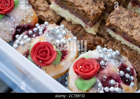 Closeup shot of decorated holiday cupcakes in a box Stock Photo