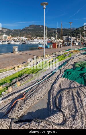Fishing nets, fishing boats in the port of Port de Sóller, Mallorca island, Stock Photo