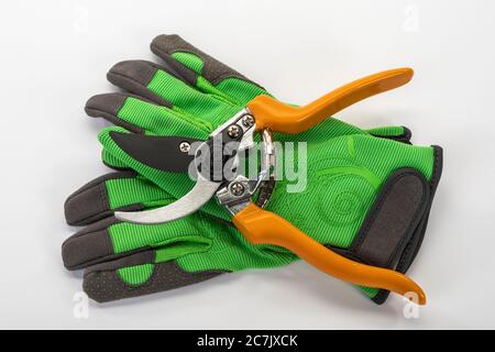 Garden gloves, bypass secateurs from 'Garden Feelings', white background, Stock Photo