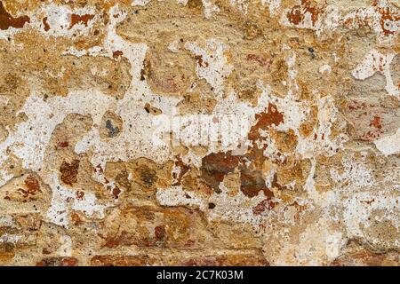 Old wall with bricks, house facade, background picture Stock Photo