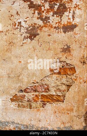 Old wall with bricks, house facade, background picture Stock Photo