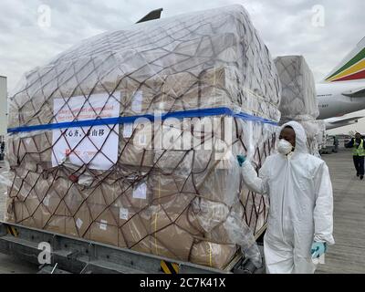 (200718) -- NAIROBI, July 18, 2020 (Xinhua) -- Staff members unload the medical supplies from China at the airport in Addis Ababa, Ethiopia, March 22, 2020. (Xinhua/Wang Shoubao)