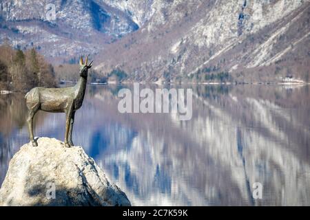 Bohinj lake, the statue of Zlatarog, the legendary chamois with golden horns, Ribcev Laz, Upper Carniola, Triglav National Park, Slovenia Stock Photo