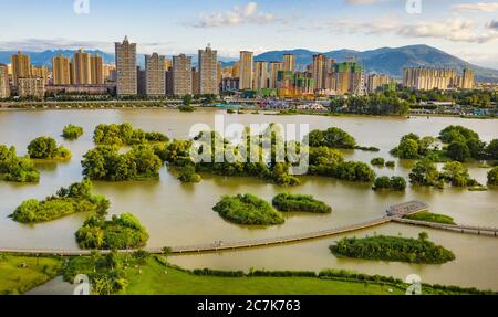 Hanzhong. 17th July, 2020. Aerial photo taken on July 17, 2020 shows a view of Hanjiang wetland in Hanzhong City, northwest China's Shaanxi Province. Credit: Tao Ming/Xinhua/Alamy Live News Stock Photo