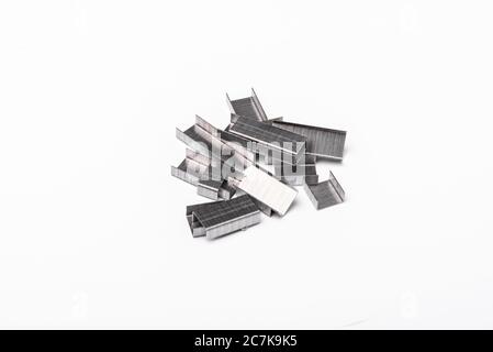 a pile of staple inserts insulated on a white surface Stock Photo