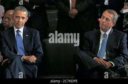 United States President Barack Obama, left, and the current Speaker of the U.S. House John Boehner (Republican of Ohio), right, attend a memorial service honoring former Speaker of the U.S. House Thomas S. Foley (Democrat of Washington) in the U.S. Capitol in Washington, DC on October 29, 2013. Foley represented Washington's 5th Congressional District was the 57th Speaker of the US House of Representatives from 1989 to 1995. He later served as US Ambassador to Japan from 1997 to 2001. U.S. Representative John Lewis (Democrat of Georgia) is at the far left behind President Obama.Credit: Aud Stock Photo