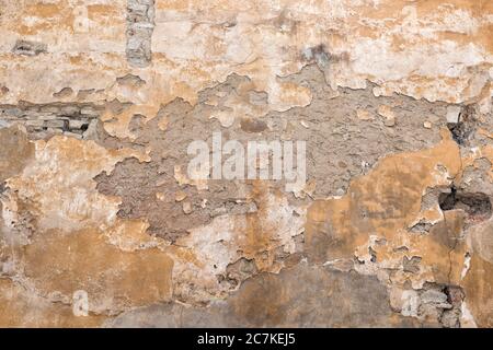 shabby plaster on an old wall photo Stock Photo