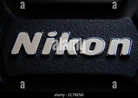 PORT-LOUIS, MAURITIUS - JULY 29, 2015: Nikon brand logo on lens cover (or lens cap). Nikon is a Japanese multinational corporation specialized in Stock Photo
