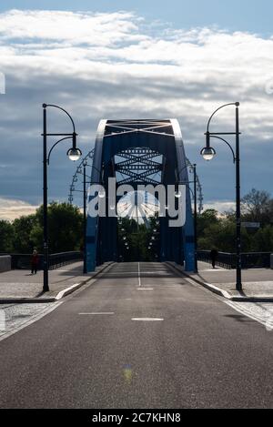 Germany, Saxony-Anhalt, Magdeburg: View over the Sternbrücke onto a 55-meter ferris wheel. It was built in the middle of a corona crisis. It is still unclear when it can be operated. Stock Photo