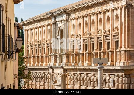 The South Facade of the Palace of Charles V in the Alhambra in late afternoon sunlight shows its wealth of Renaissance detail and rusticated stonework Stock Photo