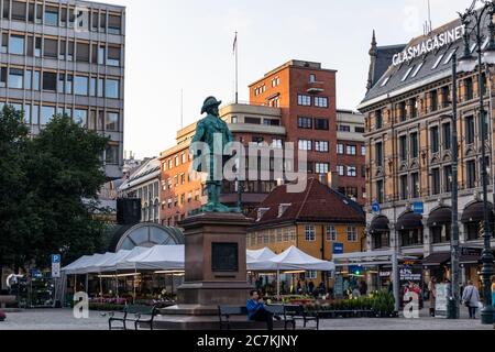 Oslo, Norway - September 10, 2019: Christian IV statue of the king of Norway in Stortorvet in central Oslo, opposite city streets life Stock Photo