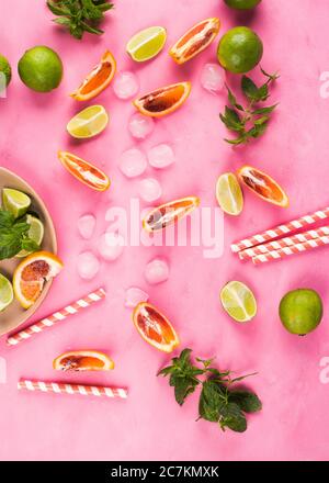 Fruit pattern of fresh orange slices on colored background. Top view ...