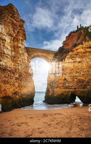 Europe, Portugal, Algarve, Litoral, Barlavento, District Faro, Lagos, bay on the cliff, Praia dos Estudantes, portrait format Stock Photo