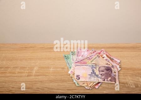 Turkish Money on wooden table Stock Photo