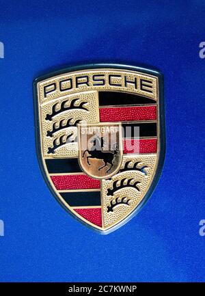 A Porsche emblem logo on a 911/997 Turbo. Stock Photo