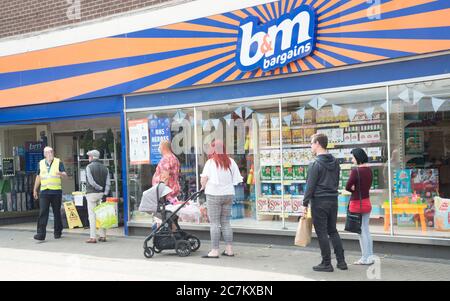 Non-essential Shops Start Open With People Queueing Outside With Social Distance 2 Metre Rules High Streets Up Here Seem Slower Than Expected Inside The Shopping Centre Is All Marked Out For Walking Non-essential Shops Start Open With People Queueing Outside With Social Distance 2 Metre Rules High Streets Up Here Seem Slower Than Expected Inside The Shopping Centre Is All Marked Out For Walking