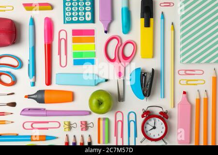 Flat lay with different school supplies on white background Stock Photo