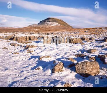 This is Pen-y-Ghent mountain, at the head of the Ribblesdale valley and village of Horton in Ribblesdale one of the famous Yorkshire Dales Three Peaks of Penyghent, Ingleborough and Whernside during the winter of 1980 Stock Photo