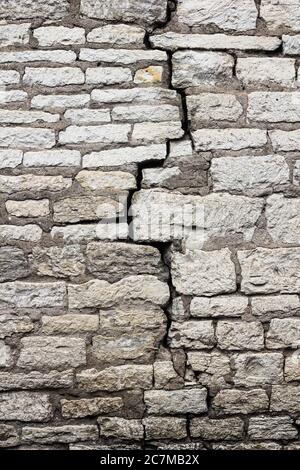a crack in the old masonry, in the wall. Stock Photo