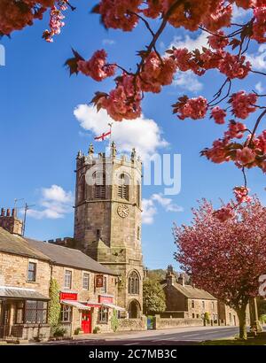 Hornby. The image is looking in the direction of St Margaret's Church on the main street of the village of Hornby in north Lancashire in the Lune valley and the River Lune during the springtime around 1990 Stock Photo