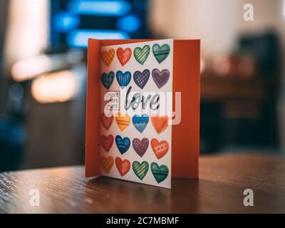 Colorful copybook with hearts and love written on it Stock Photo