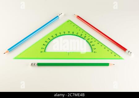 triangular ruler for studying at school isolated on a white background Stock Photo