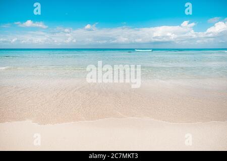 Beautiful sea landscape with white sand on a tropical island. Summer beach background. Sand and sea and sky Stock Photo