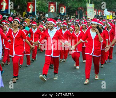 colourfully dressed upon santa's doing flashmob from buon natale