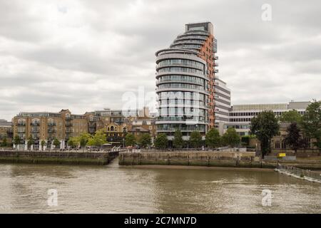 Patel Taylor Architects' Putney Wharf Tower apartment block next to Putney Bridge, London, SW15, UK Stock Photo