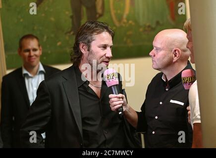 Former hockey player Peter 'Foppa' Forsberg is interviewed by the media. Photo Jeppe Gustafsson Stock Photo