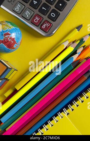 Colorful pencils and stationery products on the desk Stock Photo