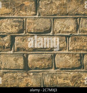 Wall made out of brown rectangular stones Stock Photo