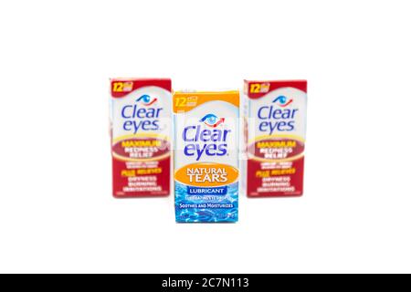 Three (3) boxes of clear eyes maximum strength redness relief and natural  tears lubricant isolated on white background Stock Photo