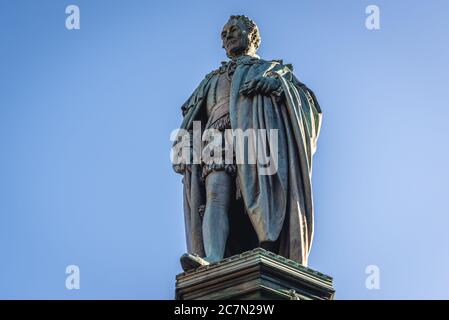 Statue of Walter Montagu Douglas Scott, 5th Duke of Buccleuch in front of St Giles Cathedral also called High Kirk of Edinburgh in Edinburgh, UK Stock Photo