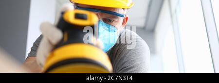 Concentrated man in face mask Stock Photo