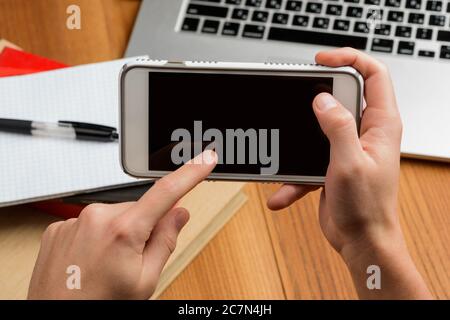 Man using a smart phone. Mockup image Stock Photo