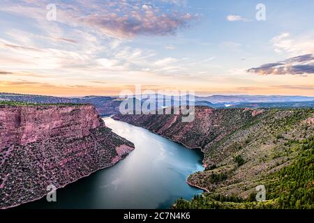 Purple aerial above view from Canyon Rim trail overlook near campground in Flaming Gorge Utah National Park with Green River at sunset twilight evenin Stock Photo