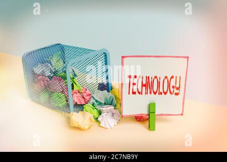 Word writing text Technology. Business photo showcasing use of scientific knowledge for practical purposes in industry Trash bin crumpled paper clothe Stock Photo