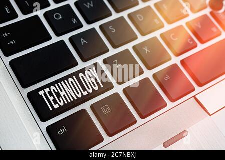 Word writing text Technology. Business photo showcasing use of scientific knowledge for practical purposes in industry Pc keyboard key with empty note Stock Photo