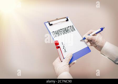 Writing note showing Transformation. Business concept for a dramatic or sweeping alteration of shape or appearance Laboratory blood test sample for me Stock Photo