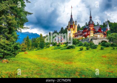 Famous Neo-Renaissance Peles castle and ornamental garden in Sinaia Carpathian Mountains in Europe. Sinaia, Prahova County, Romania Stock Photo