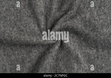 Gray woolen plaid closeup. Pattern of folds of material. Macro shot Stock Photo