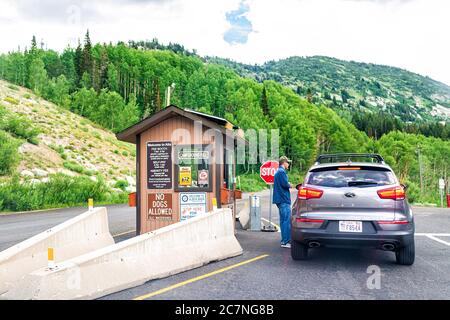 Alta, USA - July 25, 2019: Entrance with information sign to national park hiking trails in Albion Basin, Utah summer in Wasatch mountains and campgro Stock Photo