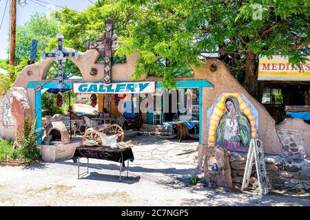 Chimayo, USA - June 19, 2019: Shop Art Gallery souvenir store in small town New Mexico city village with adobe style architecture on high road to Taos Stock Photo