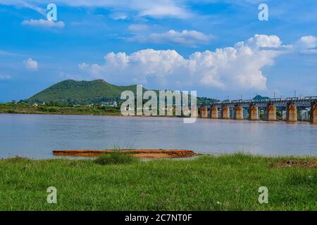 Kesinga, Kalahandi, Odisha, India. 26 June 2020. Indian Railways Bridge Over Tel River At Luthurband With Beautiful Natural Scenery. Stock Photo